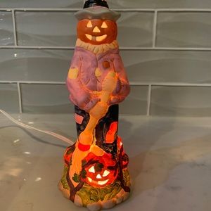 Scarecrow-lighted porcelain figure